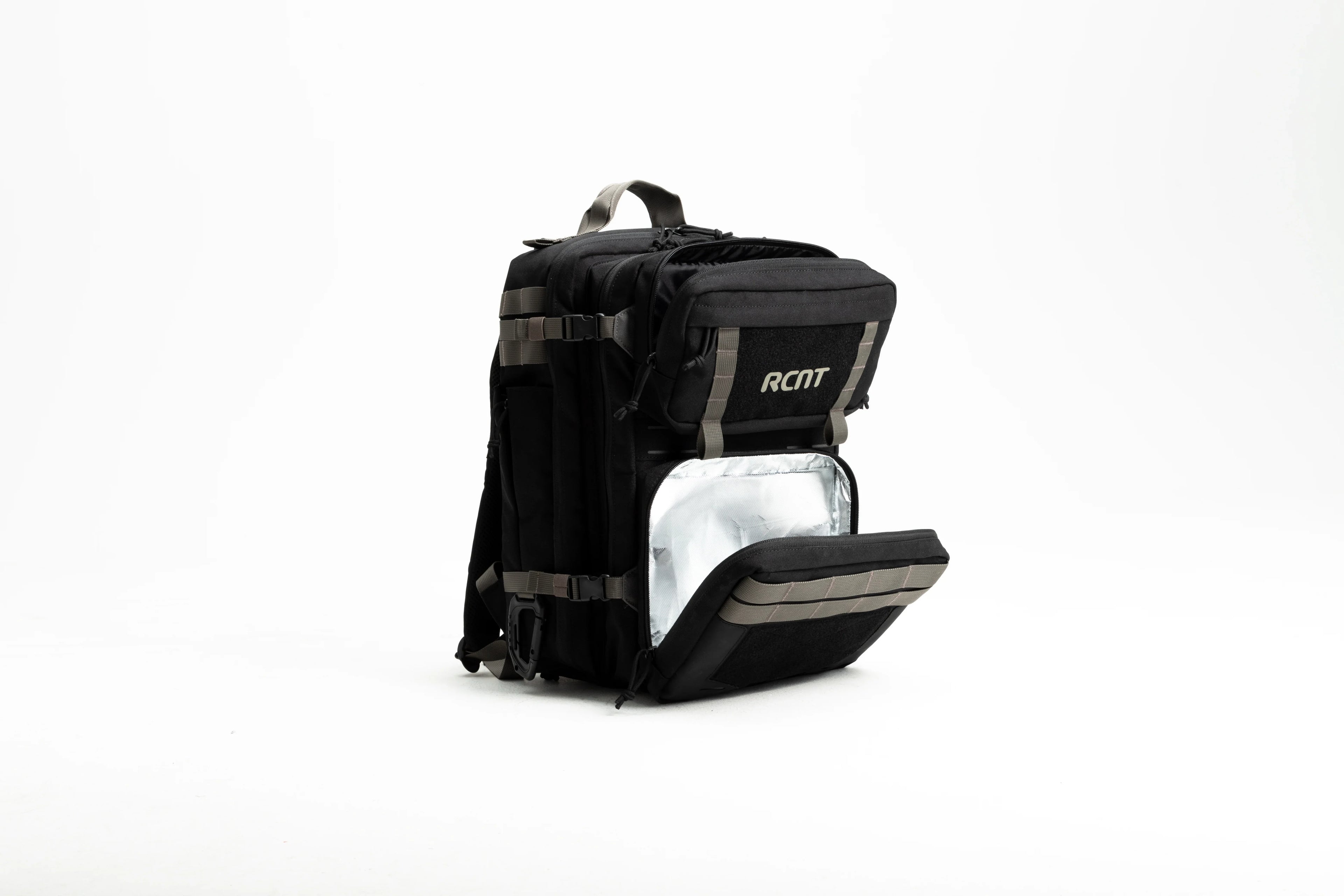 Black backpack with insulated front pocket, tan straps, and RCNT logo on white background