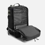 Black backpack with open front compartment showcasing multiple interior pockets and organized storage
