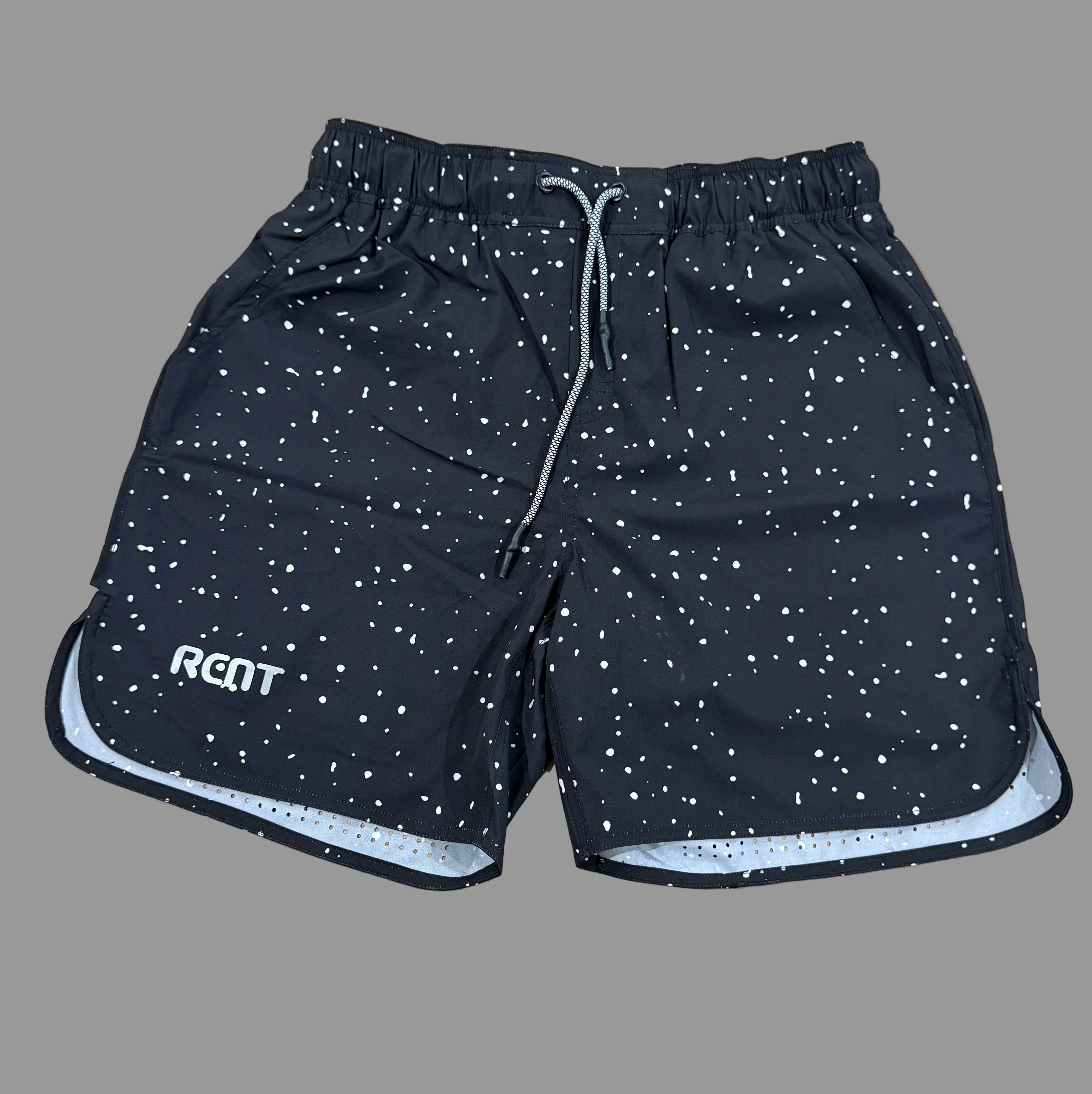 Black athletic shorts with white speckled pattern and RCNT logo on left leg