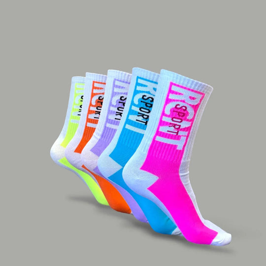 Set of colorful crew socks in neon yellow, orange, purple, blue, and pink with white accents and bold lettering
